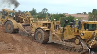 Caterpillar D8T Dozer Push Loading Caterpillar 627F Scraper [upl. by Benioff]