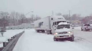 121908 F150 pulls semi truck up snowy off ramp [upl. by Ella]