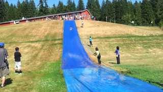 2013 NorthWest Kids Village  Slip n Slide activity [upl. by Anairam675]