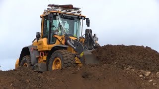 Volvo L70H pushing out soil  dirt from ditching  roadwork [upl. by Lanny]