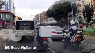 4sep2018 singapore traffic police spotting a black bmw cutting across double white line  sim avenue [upl. by Aitram]