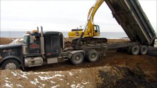 Trucks Dumping Muck from Dredging Project [upl. by Aliban521]