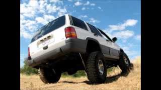 Jeep Grand Cherokee 4x4 ZJ Rubicon Express 45quot Lift 35quot Tires Suspension Rustys IRO [upl. by Ynnek]