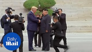 Moment Trump steps into North Korea to meet Kim Jongun [upl. by Olleina603]