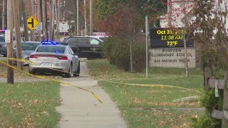 Offduty Cleveland police officer in custody after allegedly firing shot outside elementary school [upl. by Duck]