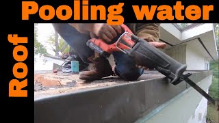 How to remove standing water quick and easy via a channel the best way to save a roof from leaking [upl. by Brenk]