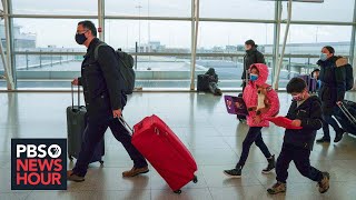 COVID19 spreads holiday misery as canceled flights strand thousands on Christmas Eve [upl. by Nolyd29]