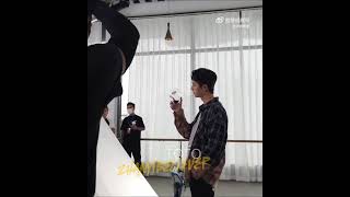 Wang Yibo following his ZhanGes footsteps  doing photoshoot with holding glass 🥛evisu wangyibo [upl. by Eiddet]