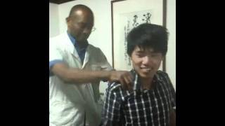 Errol Lynch of Tuina World treating neck pain in China [upl. by Willow]