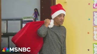 See Barack Obama surprise kids as quotSkinny Santa” in Chicago [upl. by Treat]