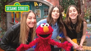 Sesame Street Elmo Sings ABC Song with HAIM and Friends [upl. by Eilsek246]