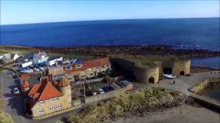 Aerial footage of Beadnell Bay and Seahouses [upl. by Aiveneg]