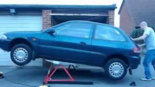 MINI TILTING CAR LIFT CL03 SUPPLIED BY CJ AUTOS [upl. by Katee]