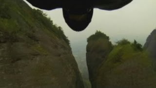 AMAZING Jeb Corliss performs flying dagger through 4metrewide valley in China at 160KPH [upl. by Meador]