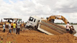 Great Recovery Dump Truck Unloading Fails Stuck in Deep Mud by Cat Excavator and Komatsu Bulldozer [upl. by Averyl]