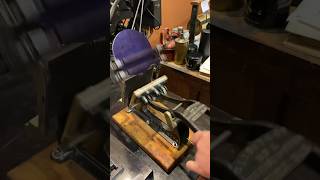 Using a tabletop printing press to print a blue picture of a printing press [upl. by Ardnekahs]