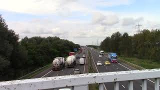 Traffic Passing Helsby Along The M56 Motorway Cheshire [upl. by Noneek]