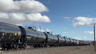 Locomotive Train passing by with Box Railcars amp black Tanker Railroad cars [upl. by Ahsemrac443]