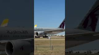 Qatar Airways 777200LR being towed to the stands at DFW Airport [upl. by Lubow]