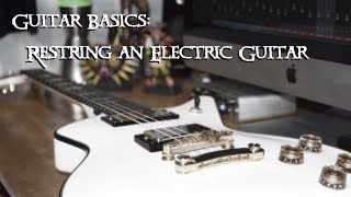 How To Change Strings On An Electric Guitar With A Fixed Bridge [upl. by Orel]