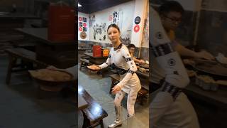 A Robotic Waiter Serves Food at a Chongqing Hotpot Restaurant in China robotserver [upl. by Radnaxela519]