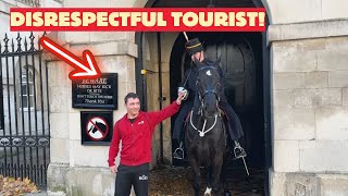 Disrespectful Tourist Ignores Multiple Warnings From Horse Guard [upl. by Ecinnahs]