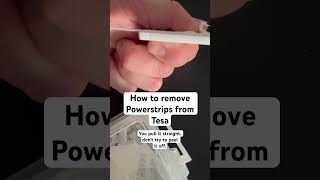 How to remove a Powerstrips by Tesa You pull it straight Dont try to peel it off [upl. by Monney362]