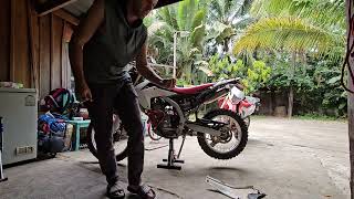 Changing a spark plug for a Honda CRF 250L [upl. by Ciaphus679]