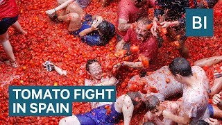 Hundreds Of Tons Of Tomatoes Are Used As Ammo In Spains Tomatina Festival [upl. by Onihc]