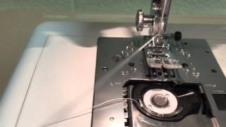 Threading your JanomeManual bobbin threading [upl. by Suiratnauq]