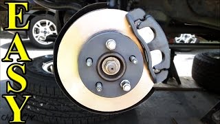 How to Replace Front Brakes Pads and Rotors [upl. by Itch]