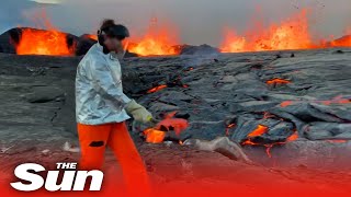 Scientists shovel molten lava for testing at Hawaiis Kilauea volcano summit [upl. by Allred]