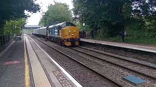 A pair of tractors thrash through Highbridge [upl. by Odrareg]