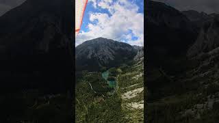 Flight over green water Paragliding Parapente Adventure FreeFlying OutdoorAdventure AerialView [upl. by Peednas]