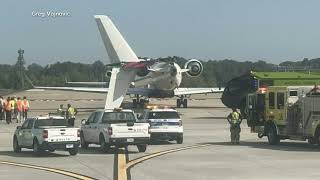 Delta flight clips another plane on taxiway knocks off smaller planes tail [upl. by Mikkanen]