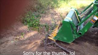 John Deere 1026R and 52quot ratchet rake [upl. by Aivon]