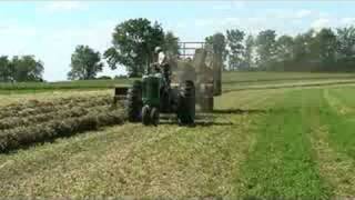 Baling hay with a John Deere 630 tractor and 336 baler [upl. by Litnahs905]