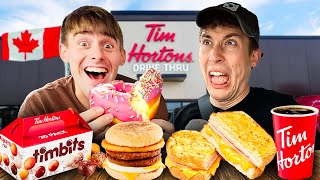 Two Brits try Tim Hortons Breakfast for the first time [upl. by Etnelav]