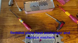 How to replace secondary  plate heat exchanger on a Viessmann Vitodens 050W boiler step by step [upl. by Oribelle]