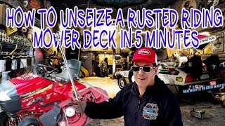 HOW TO UNSEIZE A RUSTED RIDING LAWN MOWER MOWING DECK IN 5 MINUTES WITH PB BLASTER amp A BREAKER BAR [upl. by Stovall575]