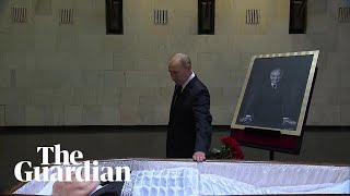 Vladimir Putin lays flowers next to open coffin of Mikhail Gorbachev [upl. by Mollee]