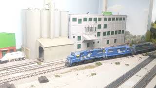 3 Conrail units lead a scrap gon train around the layout in HO Scale [upl. by Martin]