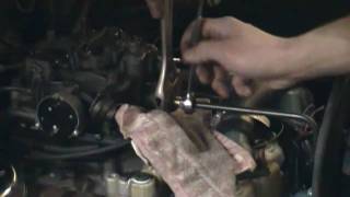 How to replace a fuel filter on a Rochester Quadrajet 4 barrel carburetor [upl. by Peoples]