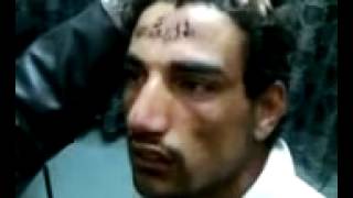 Barbaric Shiatan militia of Assad tattooed shia slogan on forehead of a trapped sunni civillian [upl. by Eberto580]