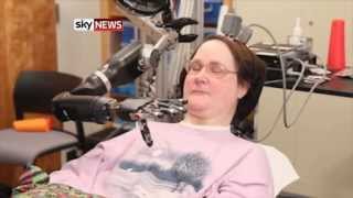 Quadriplegic Jan Scheuermann Feeds Herself With Robotic Arm [upl. by Lona]