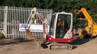 Takeuchi tb216 auction demo [upl. by Berardo]