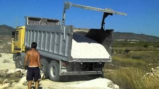 Mercedes Tipper truck dropping gravel [upl. by Animlehliw]