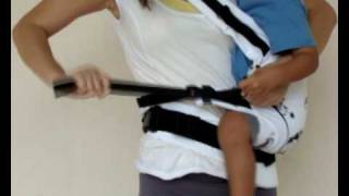 Manduca Baby Carrier Instructions  Switching from Cross Strap Front Carry to Hip Carry [upl. by Ertsevlis508]