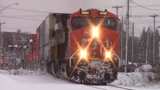 Very Long Stack Train CN 120 wDPU Passing thru Downtown Moncton NB [upl. by Jeremie219]