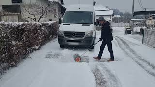 STIHL KM131 POWER SWEEPER SNOW ACTION [upl. by Lerred931]